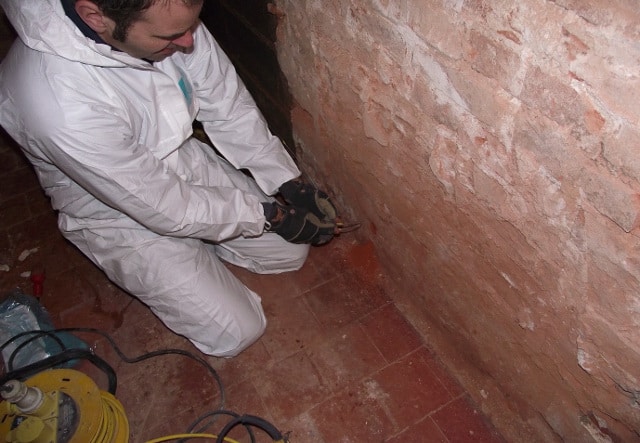 Anode folded and being inserted into the drill hole