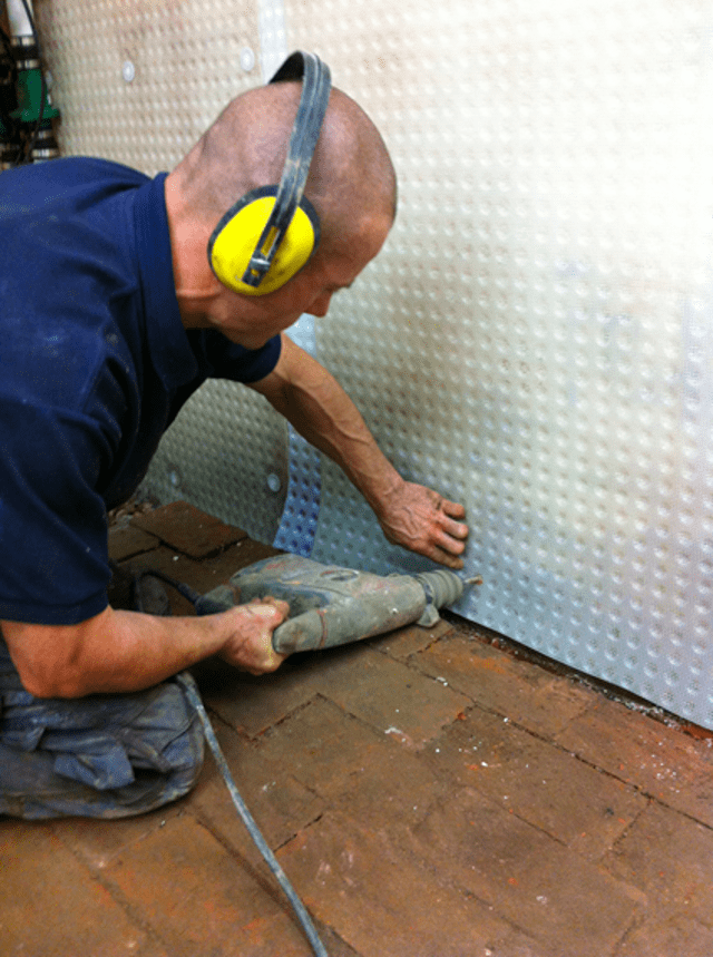 Installation of the new cavity drain membrane