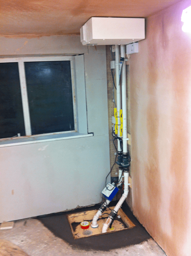 New basement sump and pump installed along with a positive pressure system