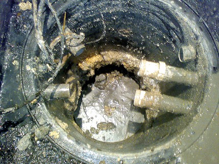 A neglected sump unit prior to servicing