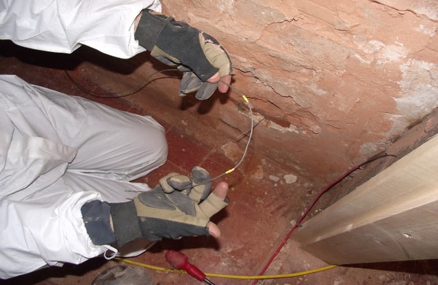 Showing anode before bend and inserting into the drill hole