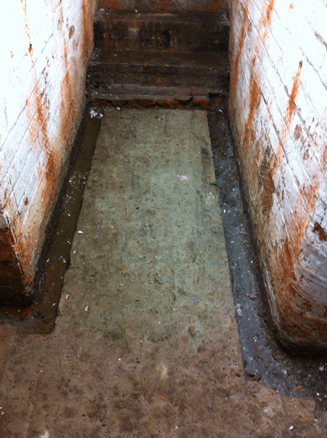 Digging out a channel for the perimeter drainage