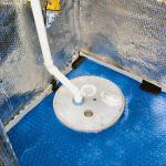 An installed sump pump unit