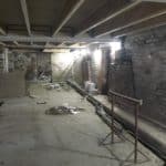 Basement being prepared for damp proof membrane installation