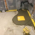 Sump pump chamber in he ground ready for he floor membrane to be applied Sump pump chamber in he ground ready for he floor membrane to be applied