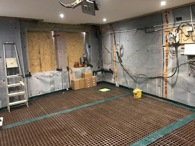 Basement with memebrane applied to the floor and walls