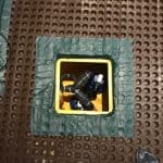 Sump pump inside chamber Closeup of sump pump inside chamber