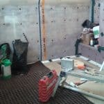 20160615_122427 Image of a basement undergoing waterproofing with membrane on the walls and floor and perimeter channel installed