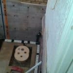 20160615_123005 Image inside a basement with installed sump pump with perimeter drain and membrane installed on the walls