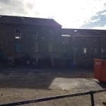 Outside of a mill awaiting conversion