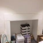 Fireplace in a damp basement