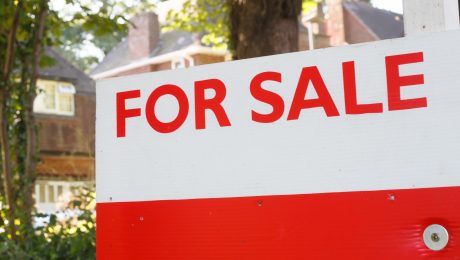 For sale sign outside a house