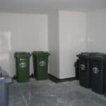 Bin store in basement with waterproofing white pvc sheets on floor