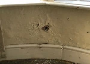 Damage plaster on an interior wall