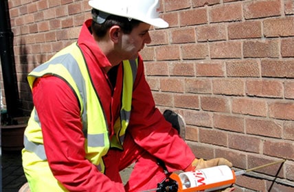 Rising damp treatment being applied