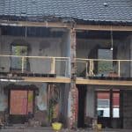 Terraced house with the rear wall removed prior to refurbishment
