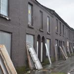 Liverpool terraced houses painted black prior to renovation
