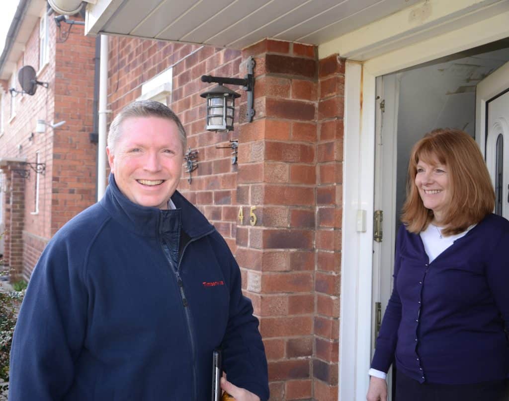 Qualified damp surveyor meeting property owner