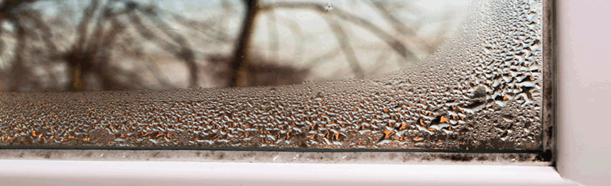 Closeup of condensation water droplets on a window