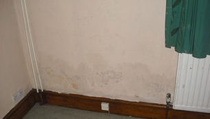 Rising damp on wall