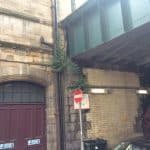 Outside of a building next to a tunnel