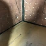 Cavity drain membrane fixed to a wall in a basement Cavity drain membrane fixed to a wall in a basement