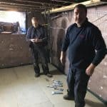 Timberwise Technicians in a basement Timberwise Technicians in a basement