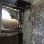 Broken window inside a damp room Broken window inside a damp room