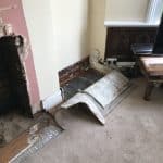 Pulled back carpets exposing floorboards Pulled back carpets exposing floorboards in living room