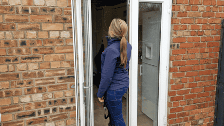 Timberwise Surveyor examining an external doorway