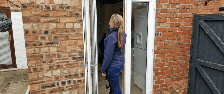 Timberwise Surveyor examining an external doorway