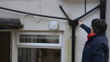 Signs of penetrating damp affecting exterior wall on house