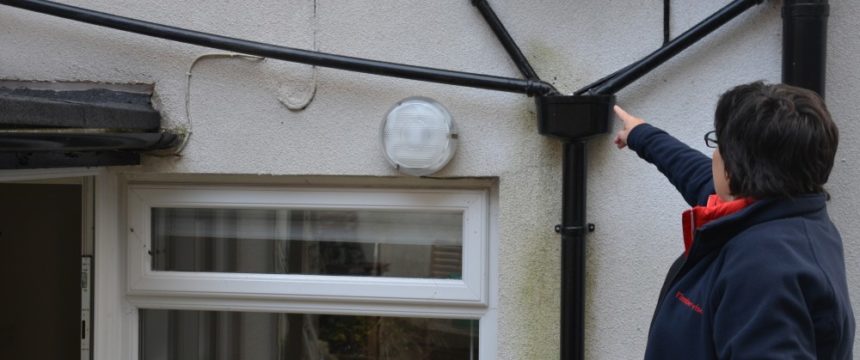 Signs of penetrating damp affecting exterior wall on house