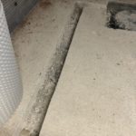 Closeup of perimeter drainage channel dug out in Liverpool basement