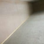 A wall in an empty retail unit Closeup of a wall in an empty retail unit