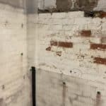 Waterproofing membrane was partially applied to the walls in Liverpool basement