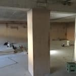 A supporting post in an empty retail unit A supporting post in an empty retail unit