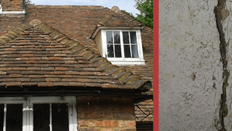 Closeup of a domestic property roof and a crack within the wall caused by rising damp