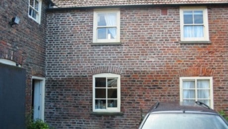 Signs of Rising Damp on the outside walls of a home