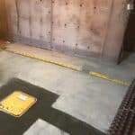 Salop Road - Channel Install 2 Perimeter drainage channel in Worcestershire basement and manhole cover with waterproofing membrane fitted to walls