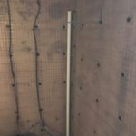 Salop Road - Membrane Application 1 Waterproofing membrane fitted to walls in corner of Worcestershire basement with pipework and wiring