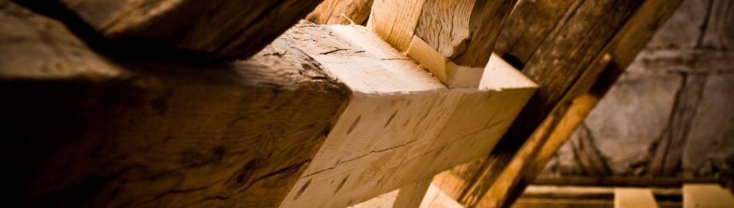 Closeup of timber repair carried out on roof beams