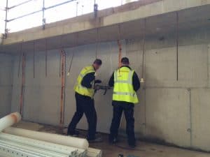 Two waterproofing experts working
