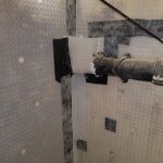 Closeup of waterpoofing membrane applied to walls in basement