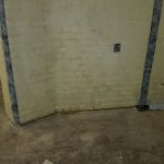 Wall covered in cavity drain membrane