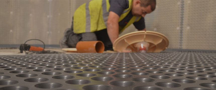 Engineer servicing a basement pump