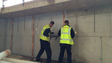 Technicians carrying out tanking works