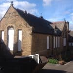 Building with boarded up windows Building with boarded up windows