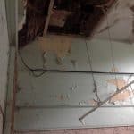 Flaking paint on a wall Closeup of flaking paint on a wall