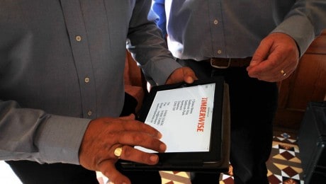 Two Timberwise engineers completing a report on a ipad